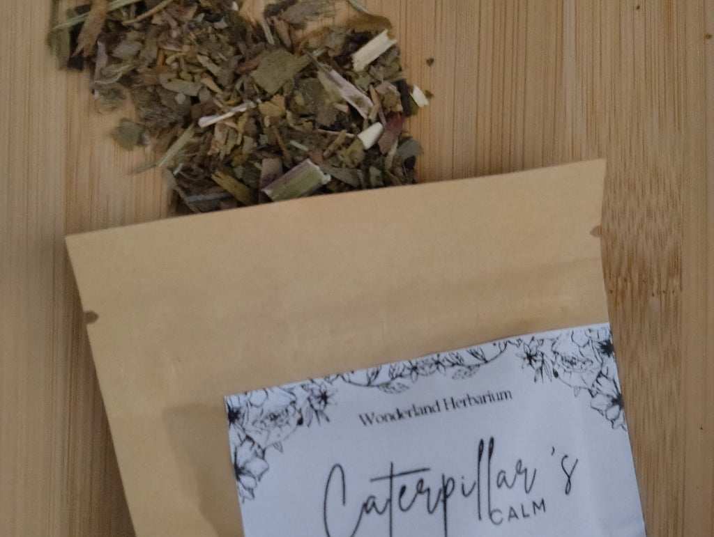Herbal tea packaging with a label on a wooden surface